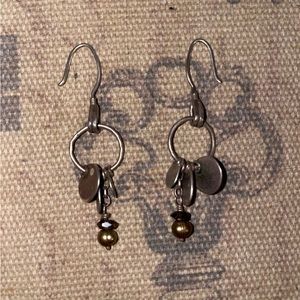 Retired Silpada sterling silver earrings.